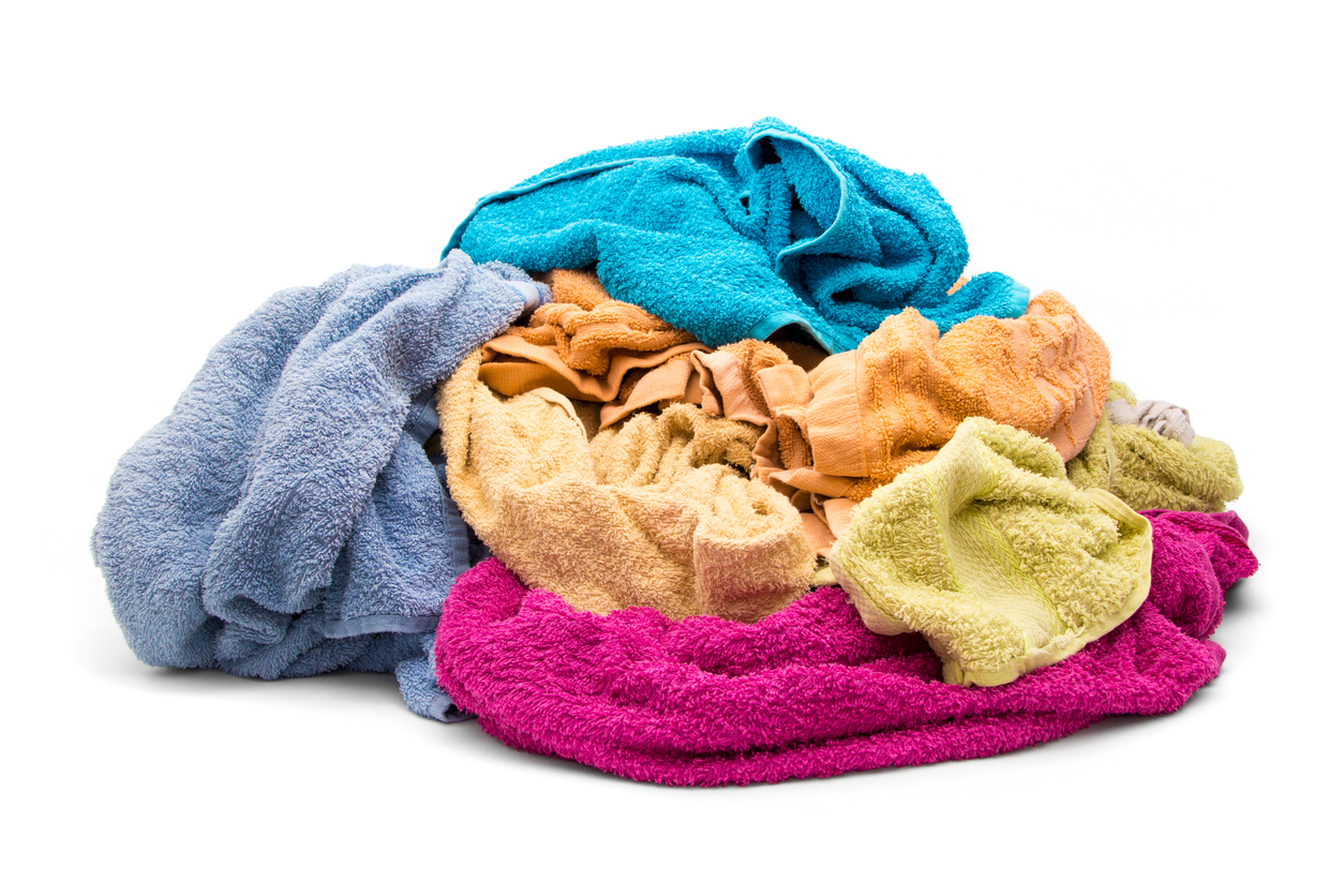 Pile of dirty and musty towels giving off odor