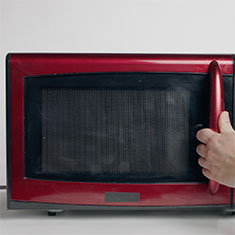 How to clean a microwave with baking soda.